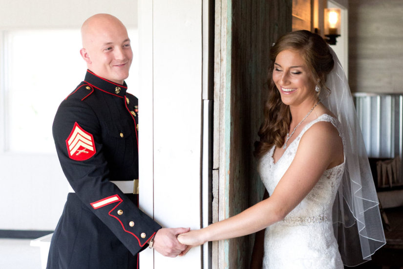 Kirk Kara military couple during wedding photoshoot holding hands