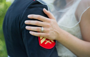 Kirk Kara engagement ring during wedding with military uniform