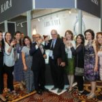 Group photo at the Kirk Kara booth at JCK celebration the Jewelers Choice tenth year win